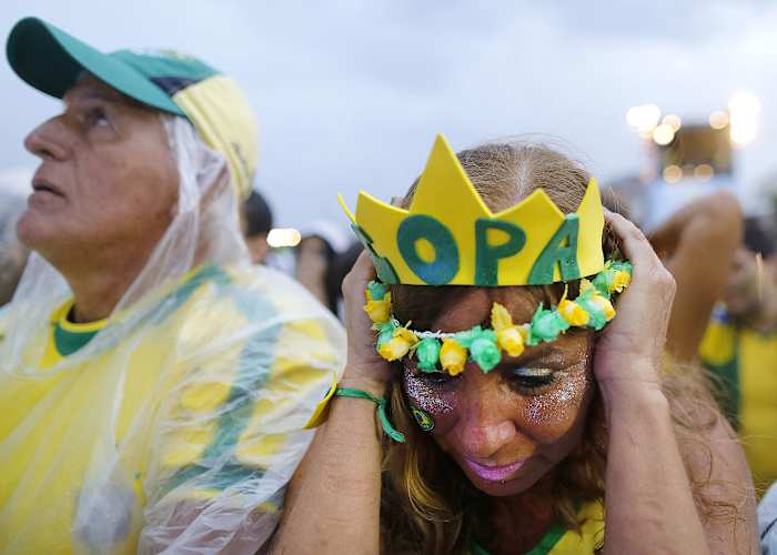 distraught-brazil-fans-9e81f36bf5c940c9b4a7a3fa7c64563a-0.jpg